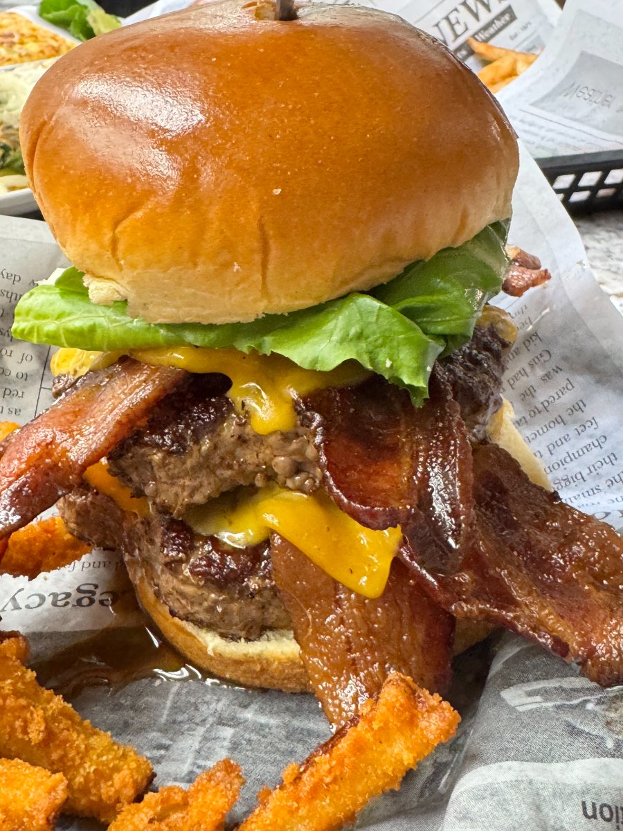 Jimmy's OMG double cheeseburger stacked with bacon, cheddar and lettuce, served with fries